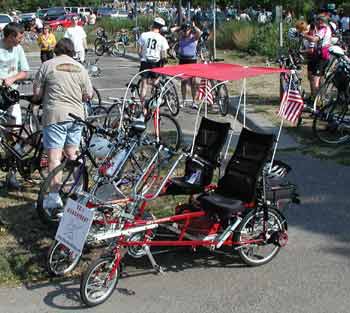 Quadribent parked at a biking event.