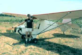 Ultralight Airplane with fields of corn in the background